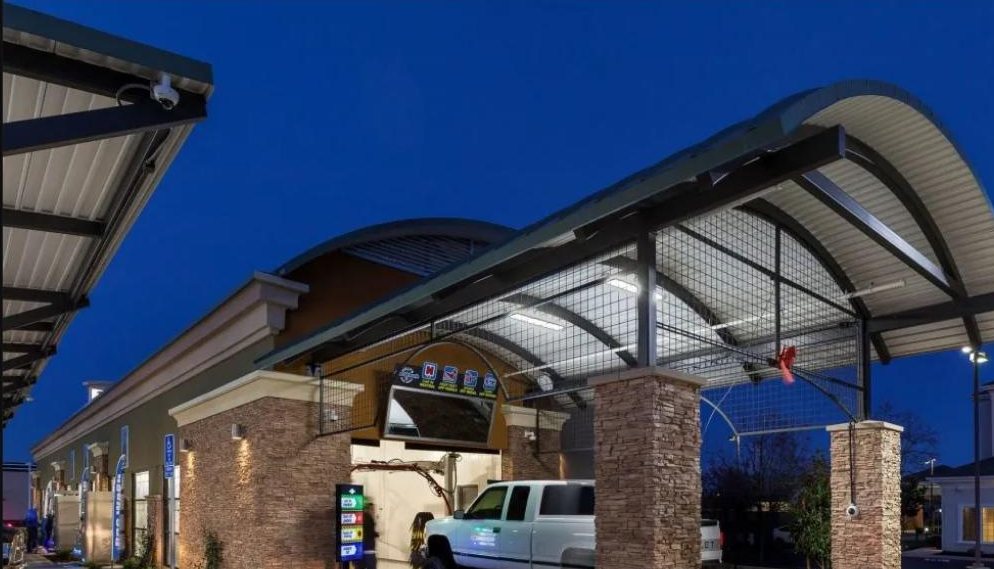 Gilly’s Car Wash vacuum canopies at dusk in Galt, California