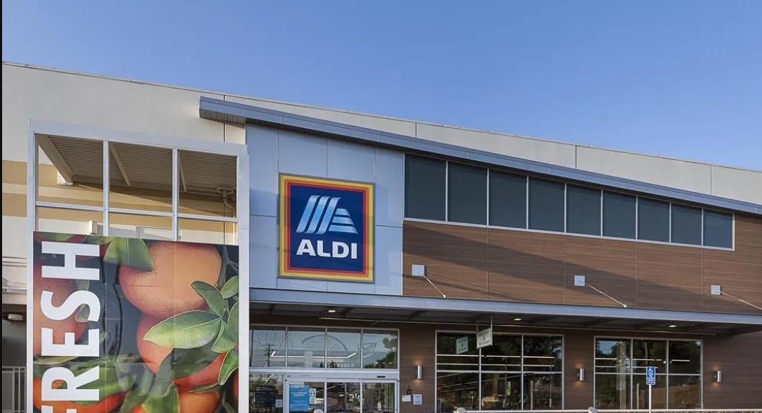 Completed ALDI storefront with wood-look facade and fresh-produce graphics, Northridge, California